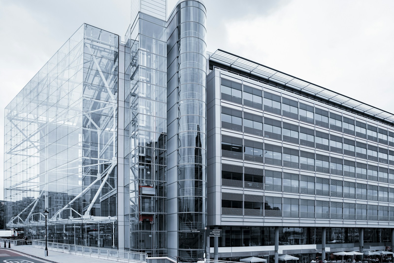 Glass and steel commercial building beside a London street