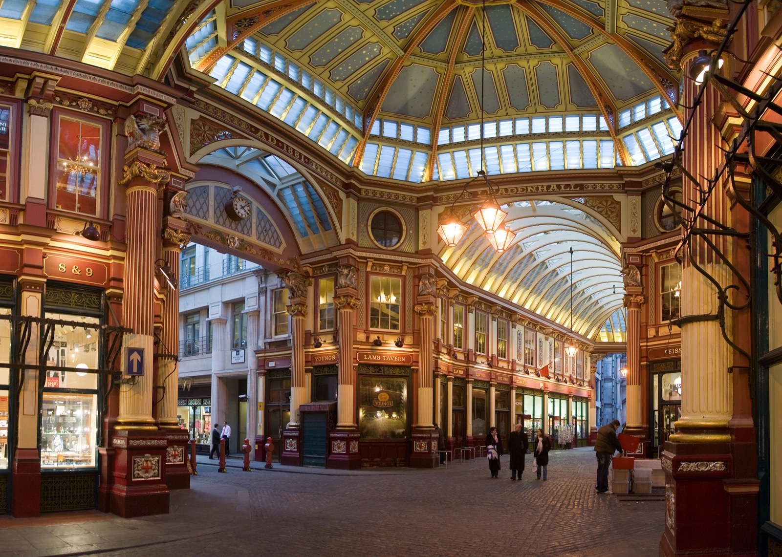 Covered Victorian shopping arcade at Leadenhall Market in the City of London, with shopfronts and a glazed roof