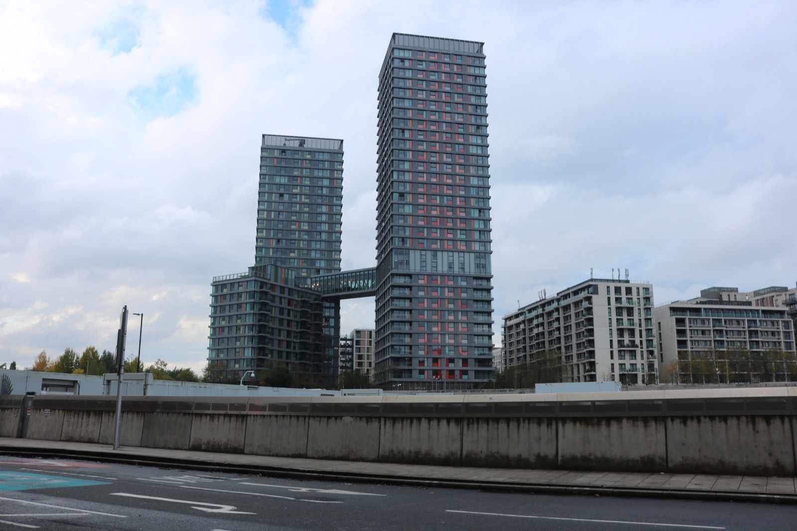 Two high-rise residential towers linked by a bridge in Stratford, east London